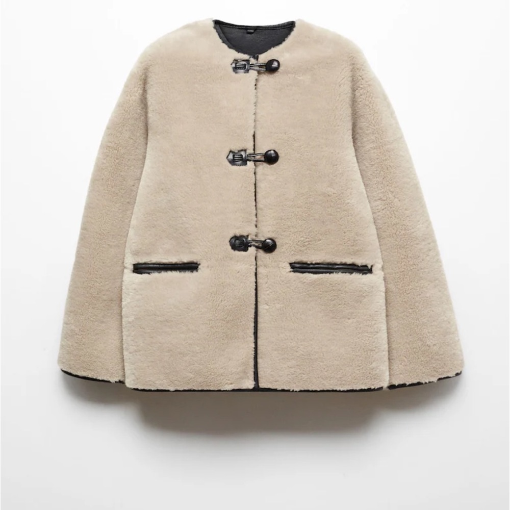 Fur-effect coat with appliqués Mango